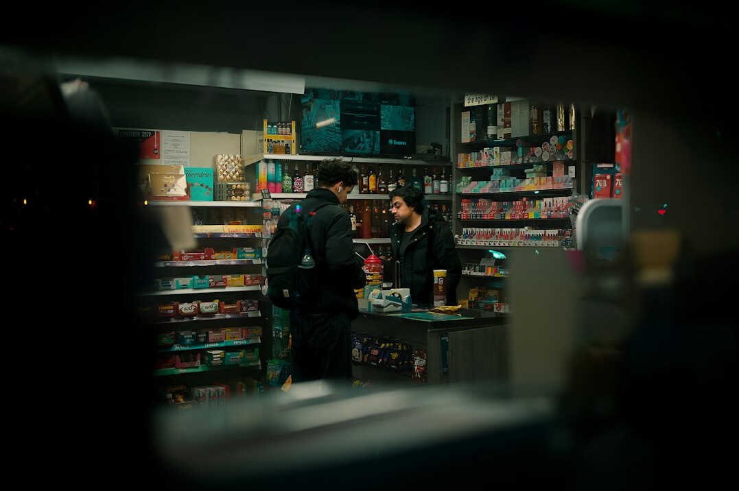 store detective watching shopper